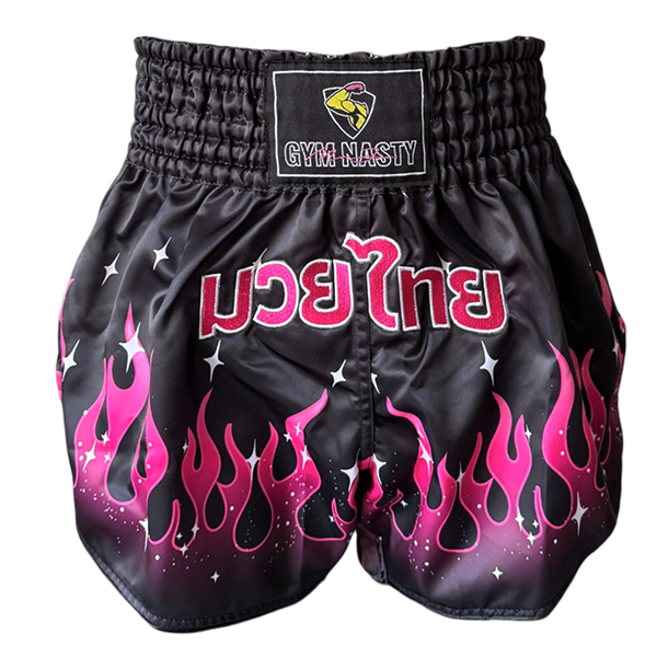 Pink Fire Muay Thai shorts with Thai text on the front. Translated to English as "Muay Thai"