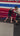 Man hitting pads in Pink Flame Muay Thai gear