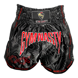 Front of black and red Muay Thai shorts with Damascus steel pattern